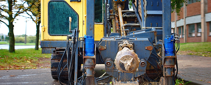 Horizontal directional drilling machine, HDD drill rig. Parked horizontal drilling rig machine . Underground pipe laying without trench excavation. Installing underground pipe, oil and gas pipeline